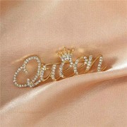 PINETS Broszka Queen cyrkonie złoty napis Królowa