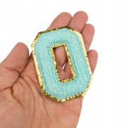 NASZYWKA duża Font cyjan LITERA O brokat błękitna