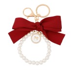 Brelok z perełkami i czerwoną kokardą Little Angel zawieszka kluczy torebki